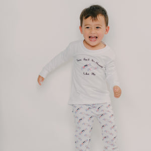 cute boy jumping in the wee bean organic bamboo sleepwear pjs in bunny candy