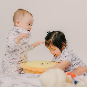 cute babies wanting to eat the wee bean egg tart plushie toy