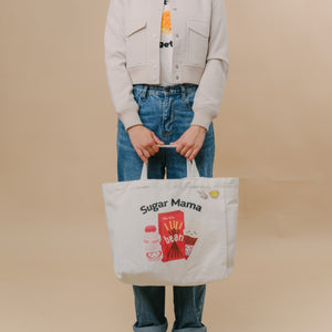 girl holding the wee bean eco-friendly reusable canvas tote bags in Sugar Mama