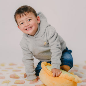 cute boy wearing the wee bean organic hoodie in little dumpling