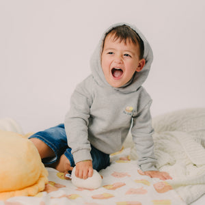 cute boy wearing the wee bean organic hoodie in little dumpling dim sum