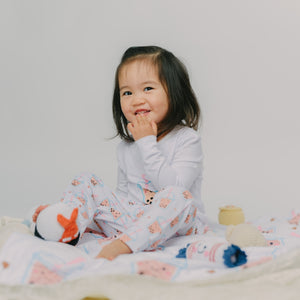 cute girl smiling in the wee bean boba bae bamboo PJ