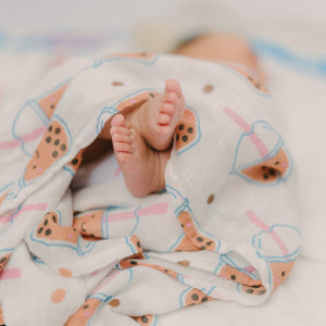 cute baby toes wrapped in boba swaddle blanket