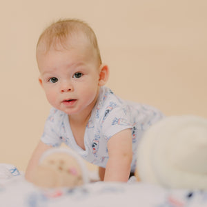 cute baby crawling in bunny candy oneise