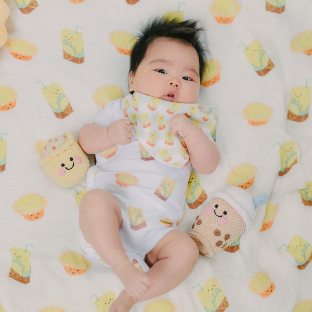 the wee bean organic cotton baby onesie bodysuit in vita lemon tea and egg tart